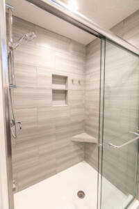 walk in shower with shelving 